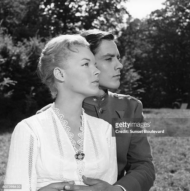 Austrian-born German actress Romy Schneider and French actor Alain Delon on the set of Christine, written and directed by Pierre Gaspard-Huit.