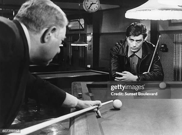 French actors Jean Gabin and Alain Delon on the set of Melodie en Sous-Sol , directed by Henri Verneuil.