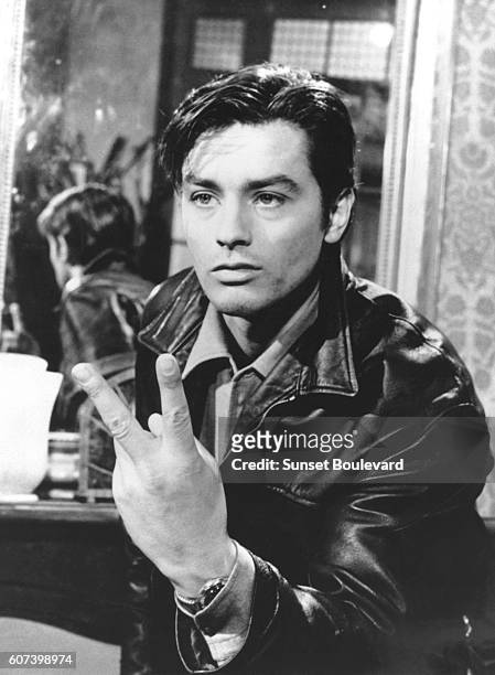 French actor Alain Delon on the set of Melodie en Sous-Sol , directed by Henri Verneuil.