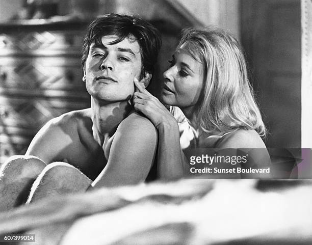 French actor Alain Delon and American actress Lola Albright on the set of Les Felins , written and directed by Rene Clement.