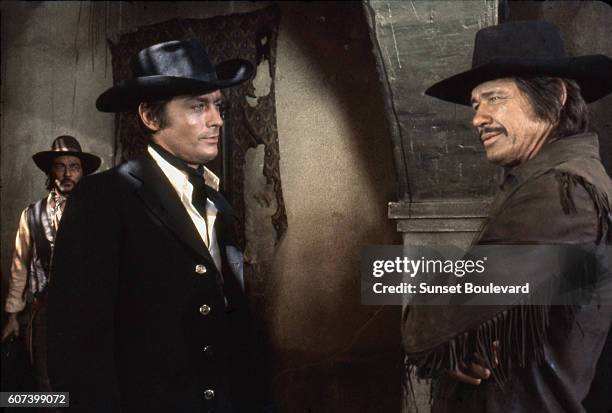 French actor Alain Delon and American actor Charles Bronson on the set of Soleil Rouge , directed by British Terence Young.