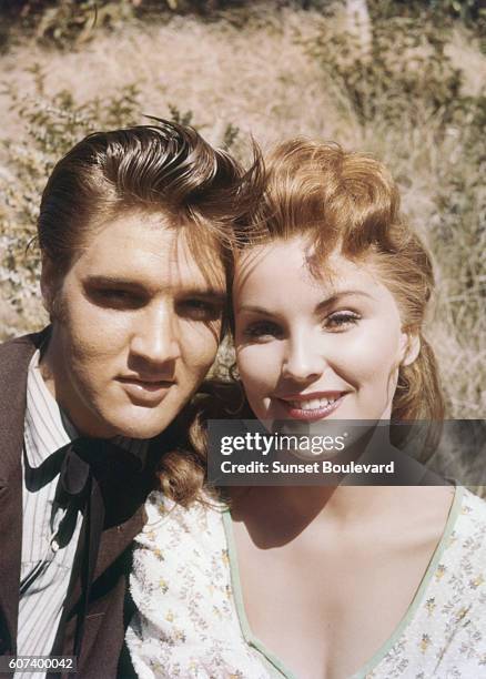 American actors Elvis Presley and Debra Paget on the set of Love Me Tender, directed by Robert D. Webb.