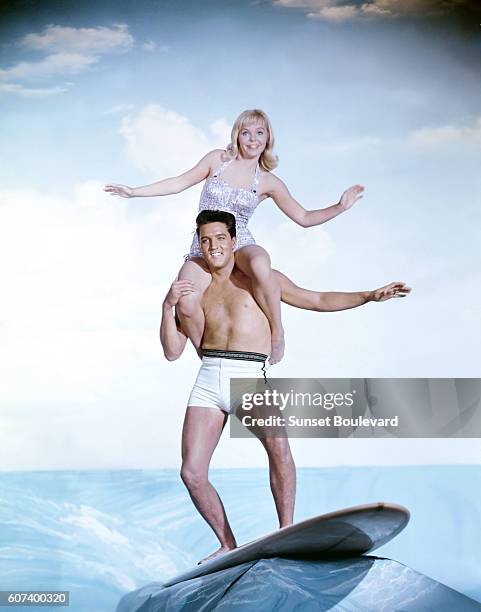 Elvis Presley and Jenny Maxwell promoting movie Blue Hawaii