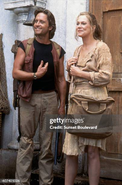 American actors Michael Douglas and Kathleen Turner on the set of Romancing the Stone directed by Robert Zemeckis.