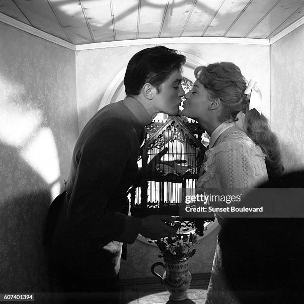 French actor Alain Delon and his partner Austrian-born German actress Romy Schneider on the set of Christine written and directed by French Pierre...