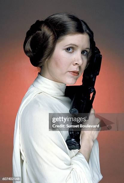 American actress Carrie Fisher on the set of Star Wars: Episode IV - A New Hope written, directed and produced by Georges Lucas.