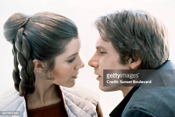 American actors Carrie Fisher and Harrison Ford on the set of Star Wars: Episode V - The Empire Strikes Back directed by Irvin Kershner.