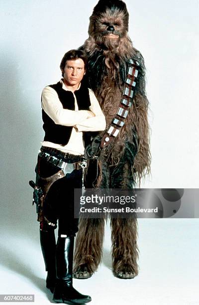 American actor Harrison Ford and British Peter Mayhew on the set of Star Wars: Episode V - The Empire Strikes Back directed by Irvin Kershner.