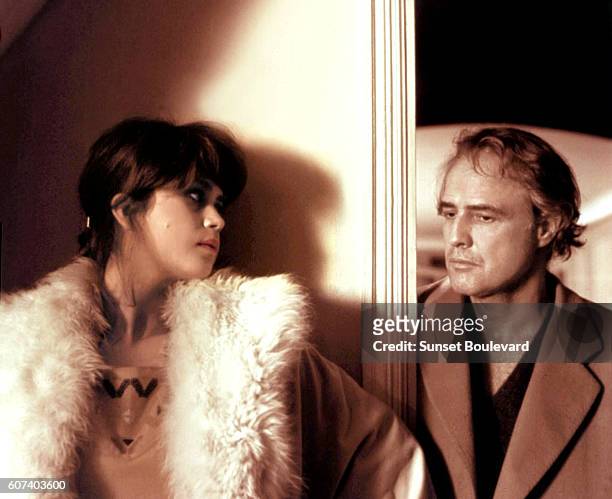 French actress Maria Schneider and American actor Marlon Brando on the set of Ultimo tango a Parigi written and directed by Italian Bernardo...