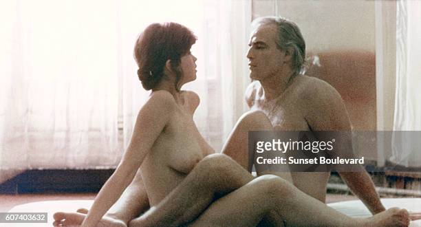 French actress Maria Schneider and American actor Marlon Brando on the set of Ultimo tango a Parigi written and directed by Italian Bernardo...