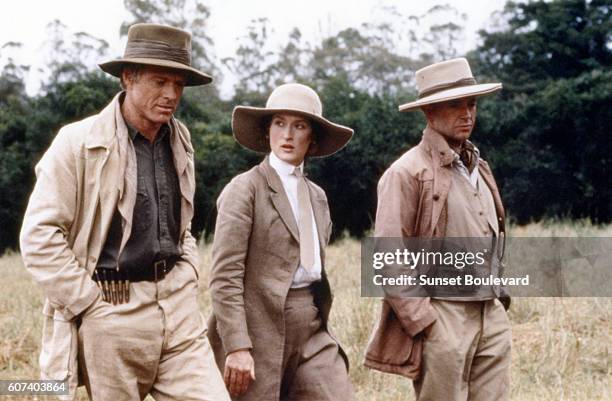 American actors Robert Redford, Meryl Streep and Austrian actor klaus-Maria Brandauer on the set of Out of Africa based on the book by Karen Blixen...
