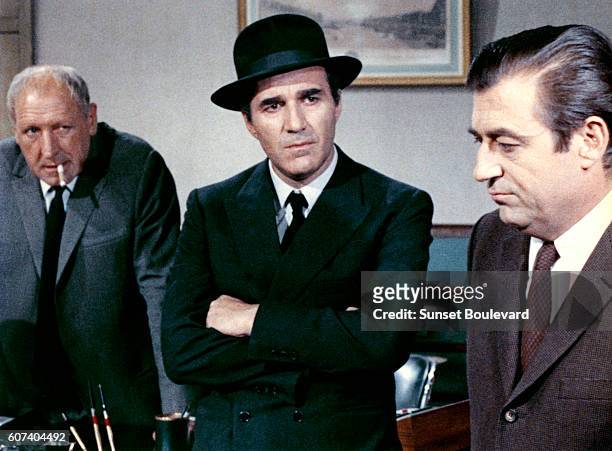 French actors Georges Wilson, Michel Piccoli and Francois Perier on the set of Max et les ferrailleurs based on the novel by Claude Neron and...