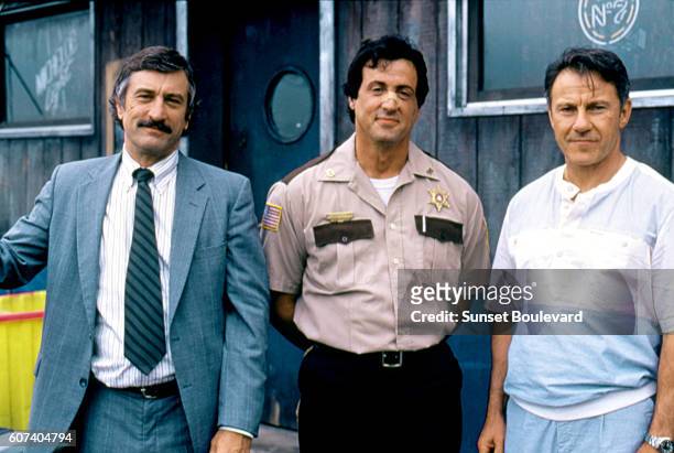 American actors Robert De Niro, Sylvester Stallone and Harvey Keitel on the set of Cop Land, written and directed by James Mangold.