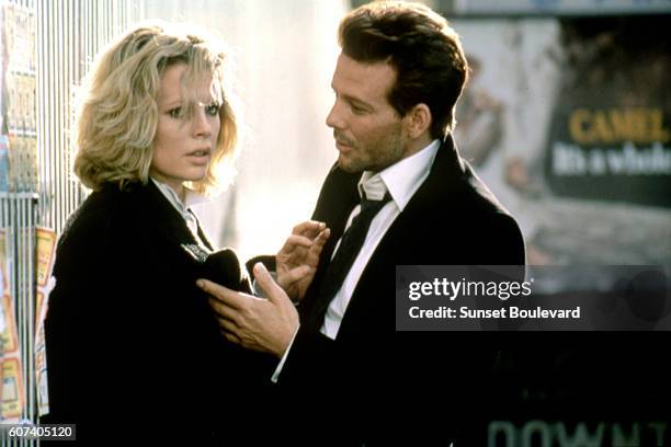 American actors Kim Basinger and Mickey Rourke on the set of Nine 1/2 Weeks directed by Adrian Lyne.