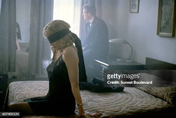 American actors Kim Basinger and Mickey Rourke on the set of Nine 1/2 Weeks directed by Adrian Lyne.