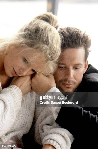 American actors Kim Basinger and Mickey Rourke on the set of Nine 1/2 Weeks directed by Adrian Lyne.