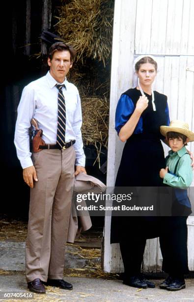 American actors Harrison Ford, Kelly McGillis and Lukas Haas on the set of Witness directed by Peter Weir.