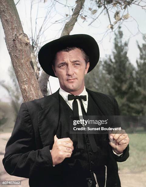 American actor Robert Mitchum on the set of The Night of the Hunter, based on the novel by Davis Grubb and directed by Charles Laughton.