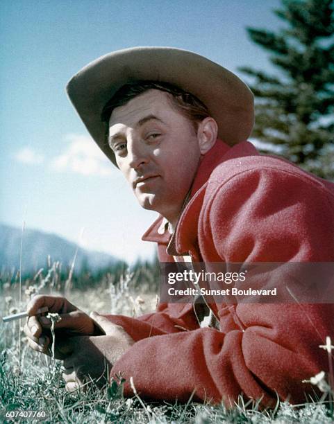 American actor Robert Mitchum on the set of Track of the Cat, based on the novel by Walter Van Tilburg Clark and directed by William A. Wellman.