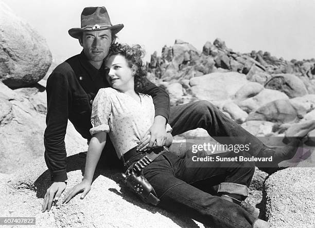 American actors Gregory Peck and Anne Baxter on the set of Yellow Sky, directed by William A. Wellman.