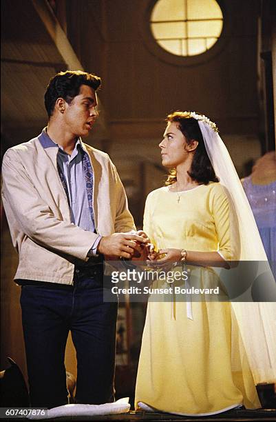 American actors Richard Beymer and Natalie Wood on the set of the musical film West Side Story, directed by Robert Wise and Jerome Robbbins.