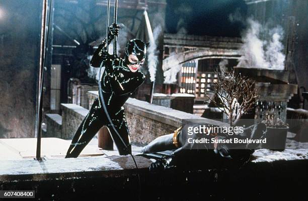 American actors Michelle Pfeiffer and Michael Keaton on the set of Batman Returns, directed by Tim Bruton.
