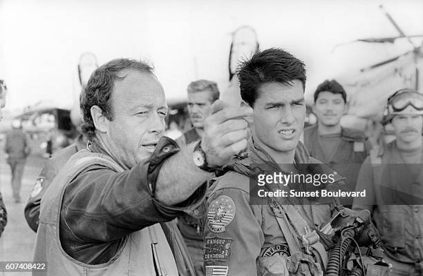 American actor Tom Cruise with British director Tony Scott on the set of his movie Top Gun.