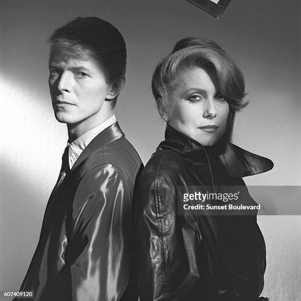 British singer and actor David Bowie and French actress Catherine Deneuve on the set of The Hunger, directed by Tony Scott.