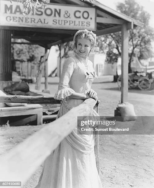 American actress Grace Kelly on the set of High Noon, directed by Austrian-American Fred Zinnemann.