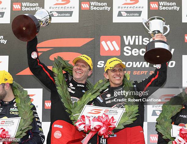 Warren Luff and Garth Tander of Holden Racing Team Holden celebrate after winning the Sandown 500 at the Sandown International Motor Raceway on...