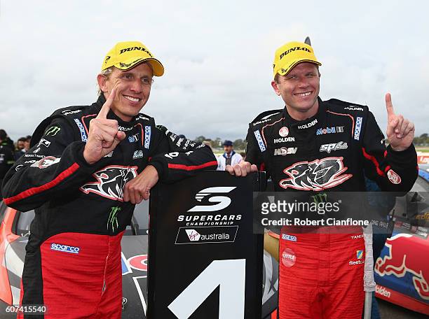 Warren Luff and Garth Tander of Holden Racing Team Holden celebrate after winning the Sandown 500 at the Sandown International Motor Raceway on...