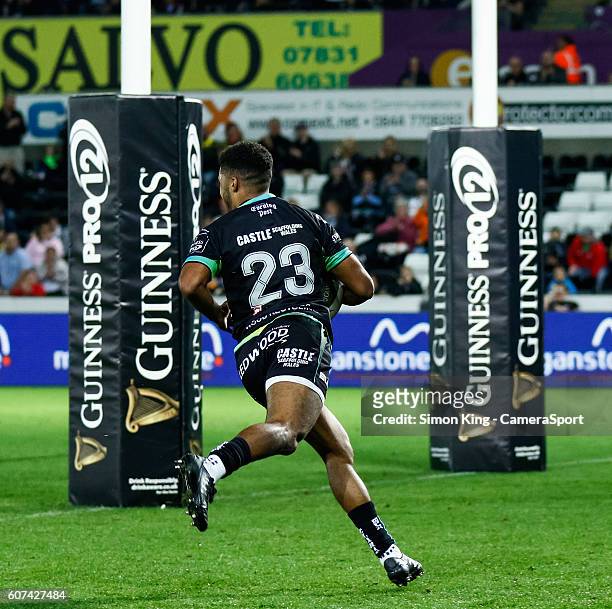 Keelan Giles of Ospreys scores his sides eighth try during the Guinness PRO12 Round 3 match between Ospreys and Benetton Rugby Treviso at Liberty...