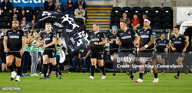 Ospreys players take to the pitch during the Guinness PRO12 Round 3 match between Ospreys and Benetton Rugby Treviso at Liberty Stadium on September...