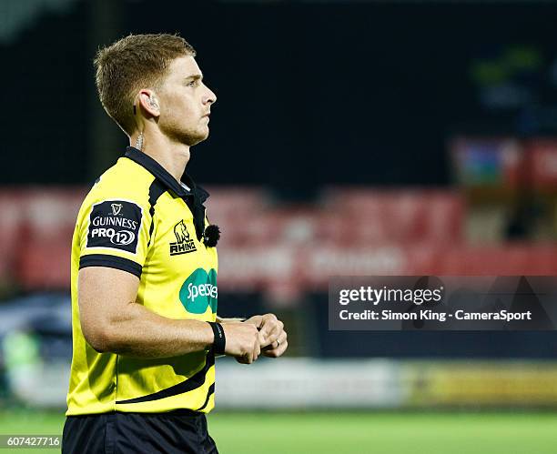 Referee Lloyd Linton waits for the TMO during the Guinness PRO12 Round 3 match between Ospreys and Benetton Rugby Treviso at Liberty Stadium on...