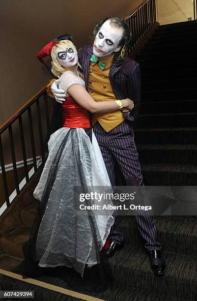 Cosplayers Zoe Oliva dressed as Harley Quinn marries Jesse Oliva dressed as The Joker at the Long Beach Comic Con held at Long Beach Convention...