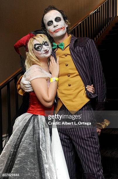 Cosplayers Zoe Oliva dressed as Harley Quinn marries Jesse Oliva dressed as The Joker at the Long Beach Comic Con held at Long Beach Convention...