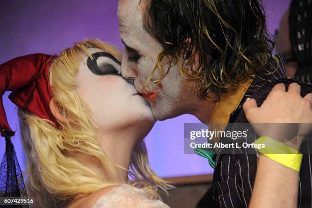 Cosplayers Zoe Oliva dressed as Harley Quinn marries Jesse Oliva dressed as The Joker at the Long Beach Comic Con held at Long Beach Convention...