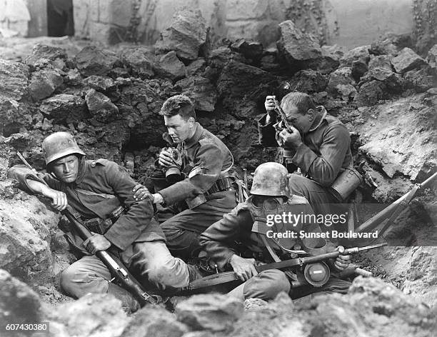 On the set of All Quiet on the Western Front, directed by Lewis Milestone.