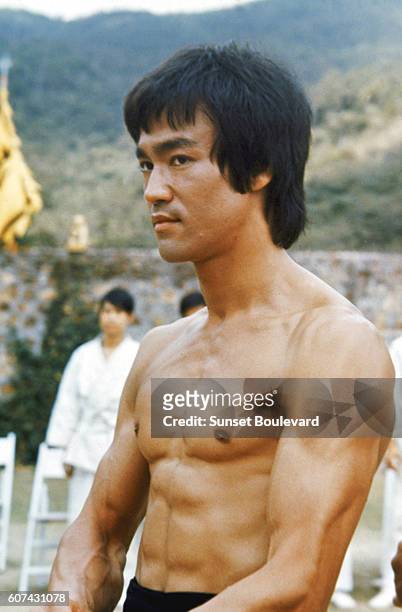 Chinese American martial artist and actor Bruce Lee on the set of Enter the Dragon, directed by Robert Clouse.
