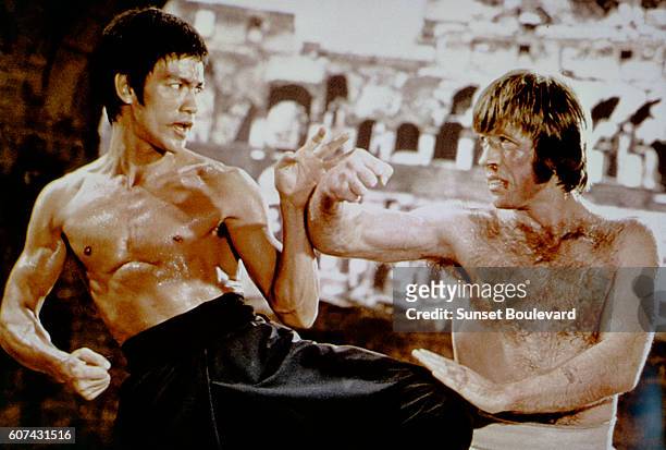 American martial artist Chuck Norris with Chinese American martial artist, actor, director and screenwriter Bruce Lee on the set of his movie Meng...