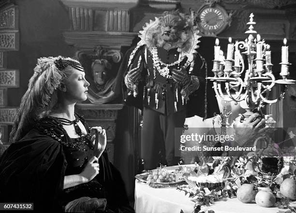 French actors Josette Day and Jean Marais on the set of La Belle et la Bête, written and directed by Jean Cocteau.