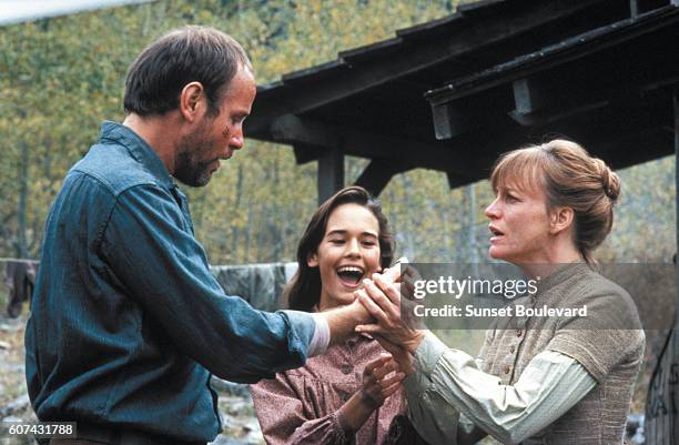 American actors Michael Moriarty, Sydney Penny and Carrie Snodgress on the set of Pale Rider, directed and produced by Clint Eastwood.