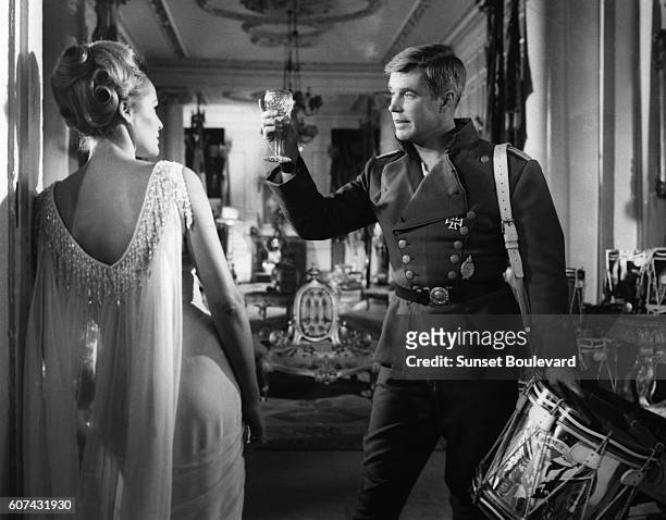 Swiss-American actress Ursula Andress and American actor George Peppard on the set of The Blue Max, based on the novel by Jack Hunter and directed by...