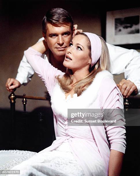 American actor George Peppard and Swiss-American actress Ursula Andress on the set of The Blue Max, based on the novel by Jack Hunter and directed by...