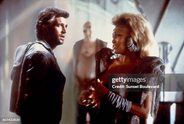 American actor Mel Gibson and actress and singer Tina Turner on the set of Mad Max Beyond Thunderdome, directed by George Miller and George Ogilvie.