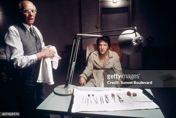 British actor Laurence Olivier and American Dustin Hoffman on the set of Marathon Man, directed by John Schlesinger.