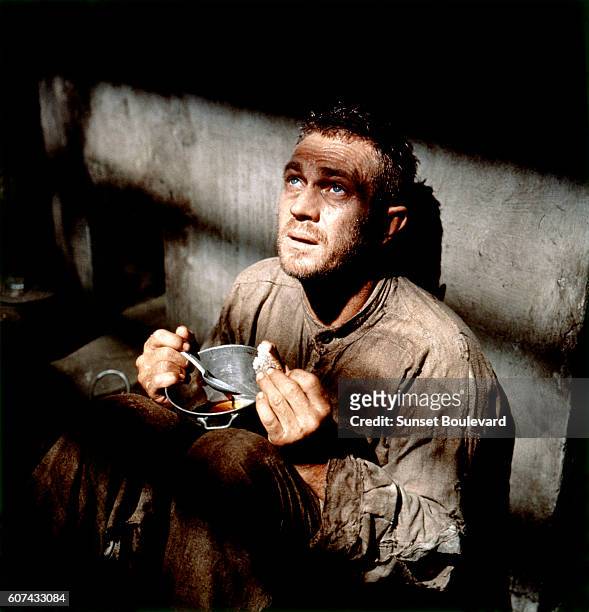 American actor Steve McQueen on the set of Papillon, directed by Franklin J. Schaffner.