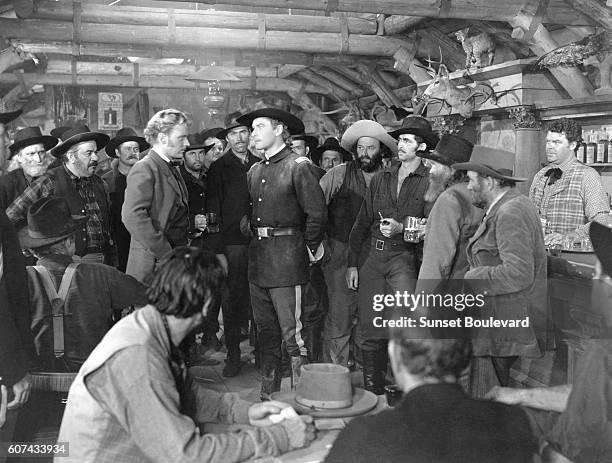 American actor Arthur Kennedy and Australian Errol flynn on the set of They Died with Their Boots On, directed by Raoul Walsh.