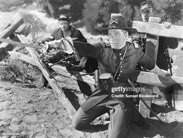 Australian actor Errol Flynn on the set of They Died with Their Boots On, directed by Raoul Walsh.