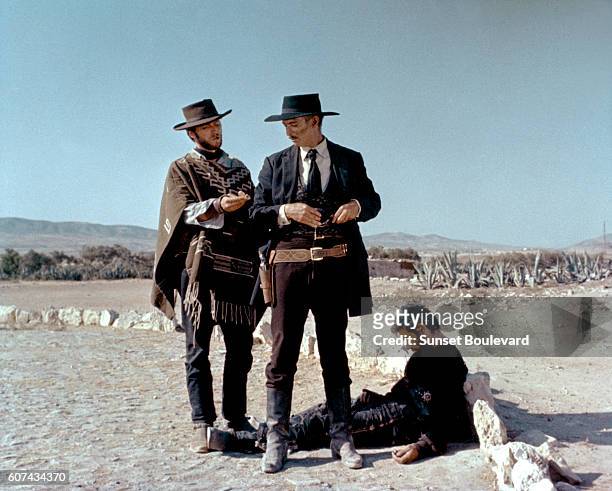 American actors Clint Eastwood, Lee Van Cleef and Italian Gian Maria Volonte on the set of For a Few Dollars More , written and directed by Sergio...